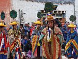 Mustang Lo Manthang Tiji Festival Day 1 04-2 Dorje Jono And Monks First Dance A very intense Dorje Jono leads the monks with peacock-feather hats in the long first dance of the Tiji Festival in Lo Manthang.